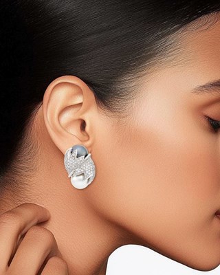 Lot 85 - Pair of White Gold, White and Gray Mabé Pearl and Diamond Earclips