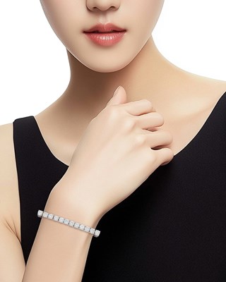 Lot 77 - White Gold and Diamond Bracelet