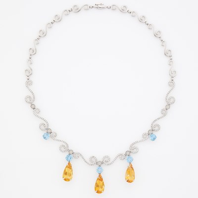 Lot 1065 - White Gold, Citrine, Blue Topaz and Diamond Necklace