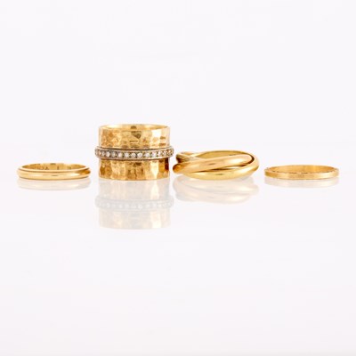 Lot 1203 - Four Gold Band Rings