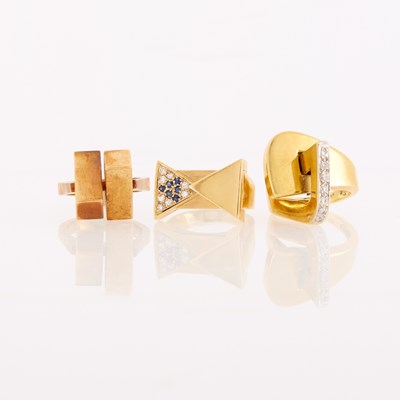 Lot 1048 - Three Gold and Diamond Abstract Rings