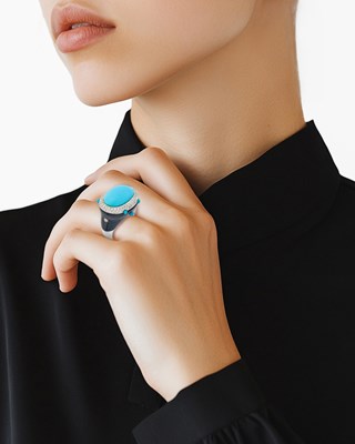 Lot 52 - White Gold, Turquoise, Black Onyx and Diamond Ring