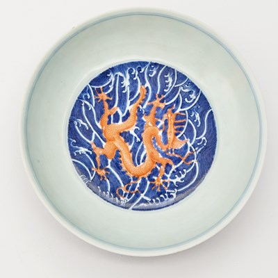 Lot 250 - A Chinese Ming Style Iron Red and Blue Porcelain 'Dragon' Dish