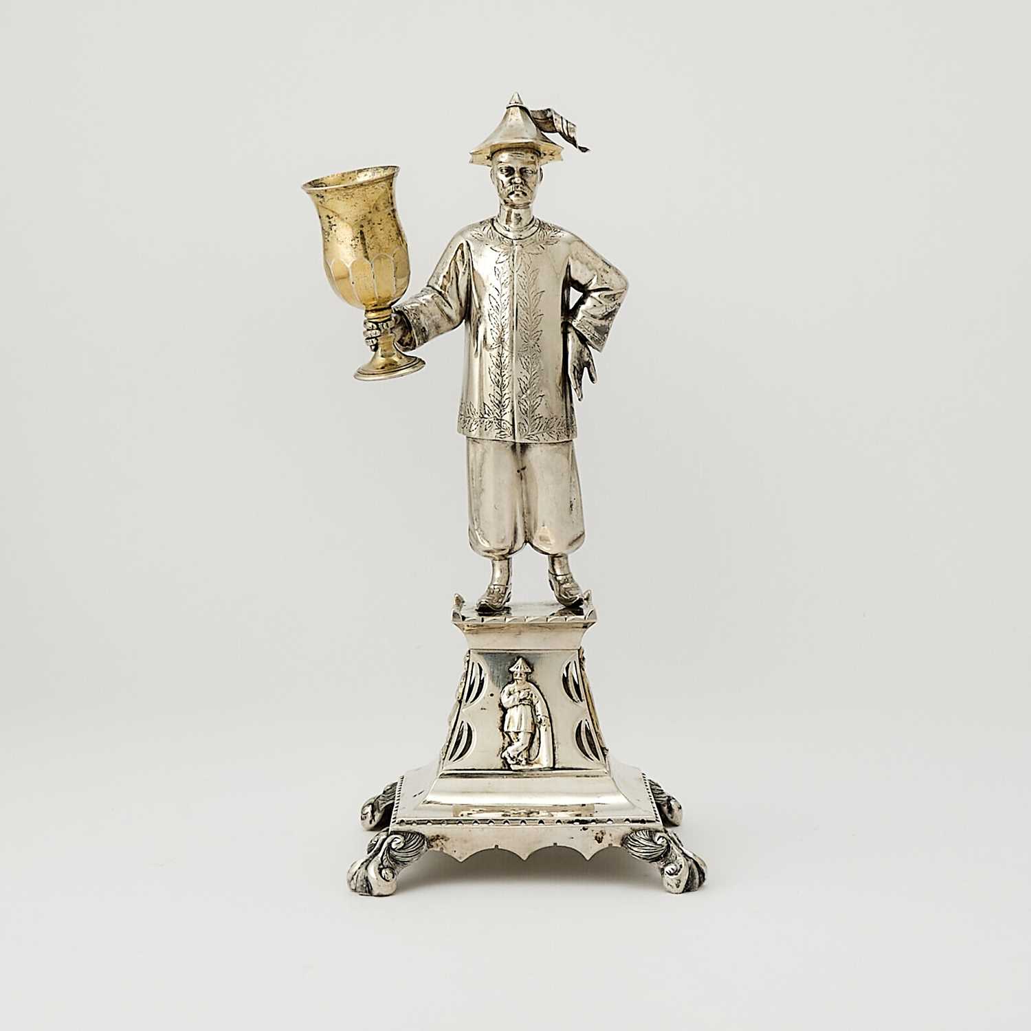 Lot 34 - Portuguese Silver and Parcel Gilt Figure of an Oriental Man
