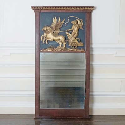 Lot 602 - Continental Neoclassical Part Ebonized and Parcel-Gilt Mahogany Mirror