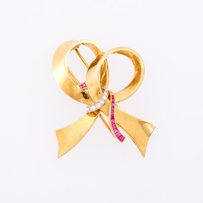 Lot 1139 - Gold, Platinum, Ruby and Diamond Bow Clip-Brooch, France