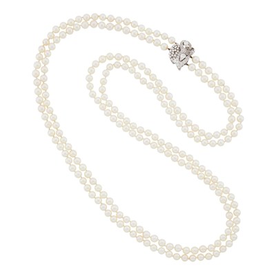 Lot 1095 - Long Double Strand Cultured Pearl Necklace with White Gold and Diamond Clasp