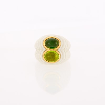 Lot 1003 - Bulgari White Ceramic, Gold and Cabochon Peridot and Tourmaline 'Chandra Doppio' Ring