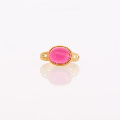 Lot 1193 - Hammered Gold, Cabochon Pink Tourmaline and Diamond Ring