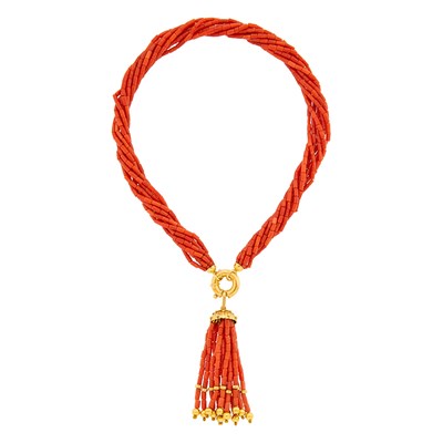 Lot 1032 - Eight Strand Coral Bead and Gold Tassel Necklace