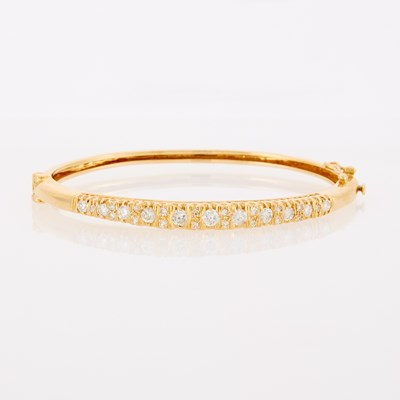 Lot 1021 - Gold and Diamond Bangle Bracelet