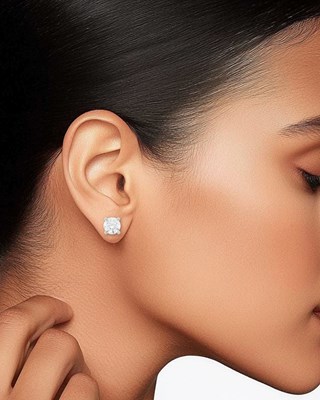Lot 79 - Tiffany & Co. Pair of Platinum and Diamond Stud Earrings