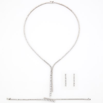 Lot 1101 - White Gold, Platinum and Diamond Necklace, Bracelet and Pair of Pendant-Earrings, France