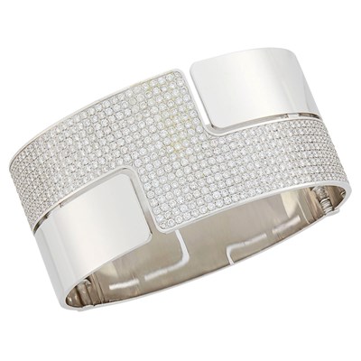 Lot 38 - Dinh Van White Gold and Diamond 'Seventies' Cuff Bangle Bracelet, France