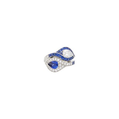 Lot 1127 - Platinum, Sapphire and Diamond Crossover Ring