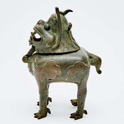 Lot 52 - A Chinese Cast Bronze Beast Form Censer