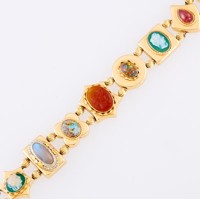 Lot 1182 - Gold, Hardstone and Gem-Set Slide Charm Bracelet