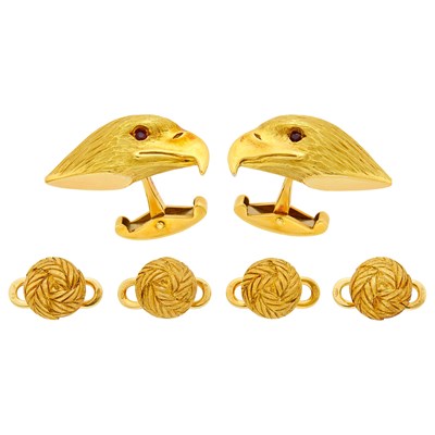 Lot 1051 - Asprey Pair of Gold and Ruby Falcon Head Cufflinks and Buccellati Four Feather Studs