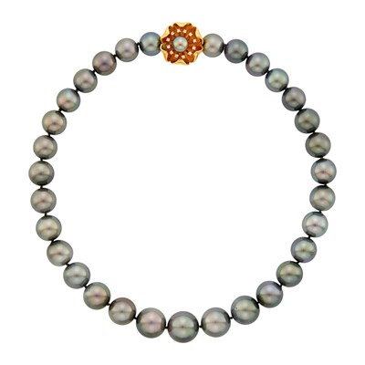 Lot 2095 - Tahitian Gray Cultured Pearl Necklace with Gold and Diamond Flower Clasp