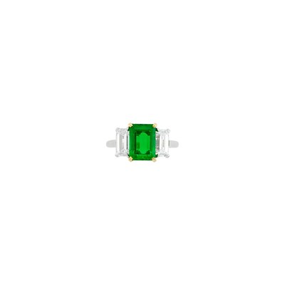 Lot 229 - Bulgari Platinum, Gold, Emerald and Diamond Ring