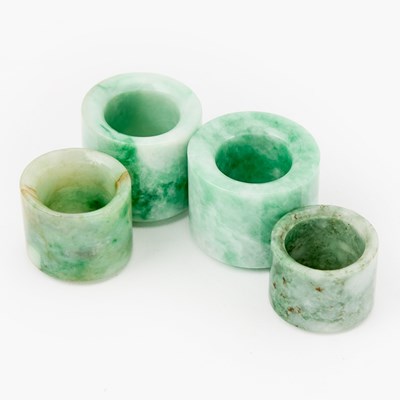 Lot 550 - Four Chinese Jadeite Thumb Rings
