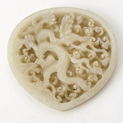 Lot 13 - A Chinese White Jade 'Dragon' Plaque