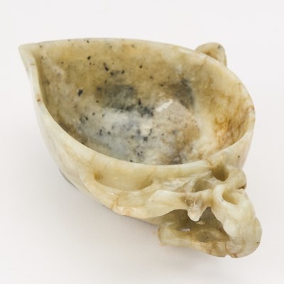 Lot 534 - A Chinese Carved Jade Washer
