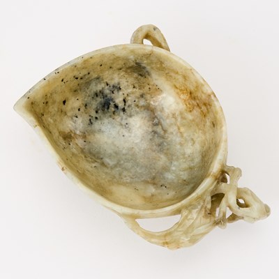 Lot 534 - A Chinese Carved Jade Washer
