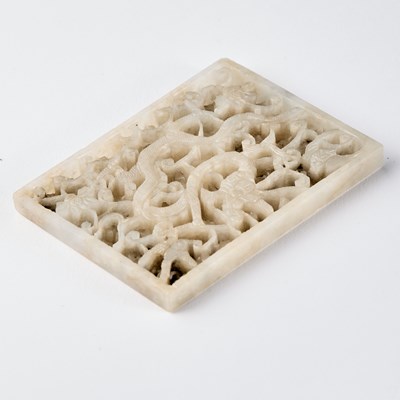 Lot 14 - A Chinese White Jade 'Dragon' Plaque