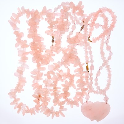 Lot 1304 - Four Tumbled Rose Quartz Bead Necklaces and Bracelet