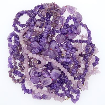 Lot 1312 - Eight Tumbled Amethyst Bead Necklaces and Bracelet