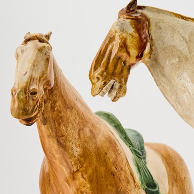 Lot 170 - A Pair of Chinese Sancai Glazed Pottery Horses