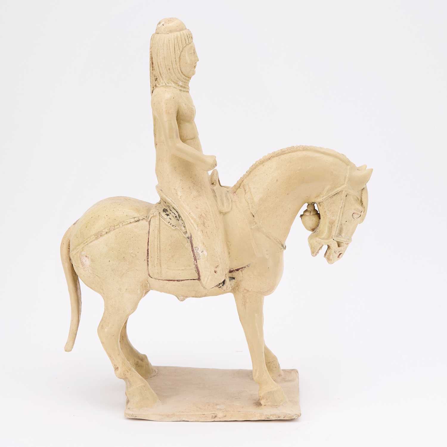 Lot 166 - A Chinese Straw Glazed Pottery Equestrian Figure