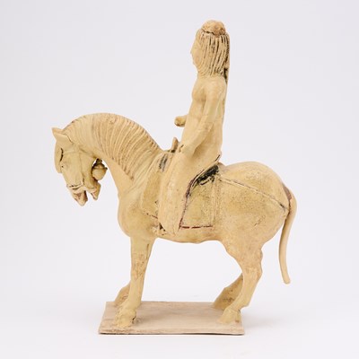Lot 166 - A Chinese Straw Glazed Pottery Equestrian Figure