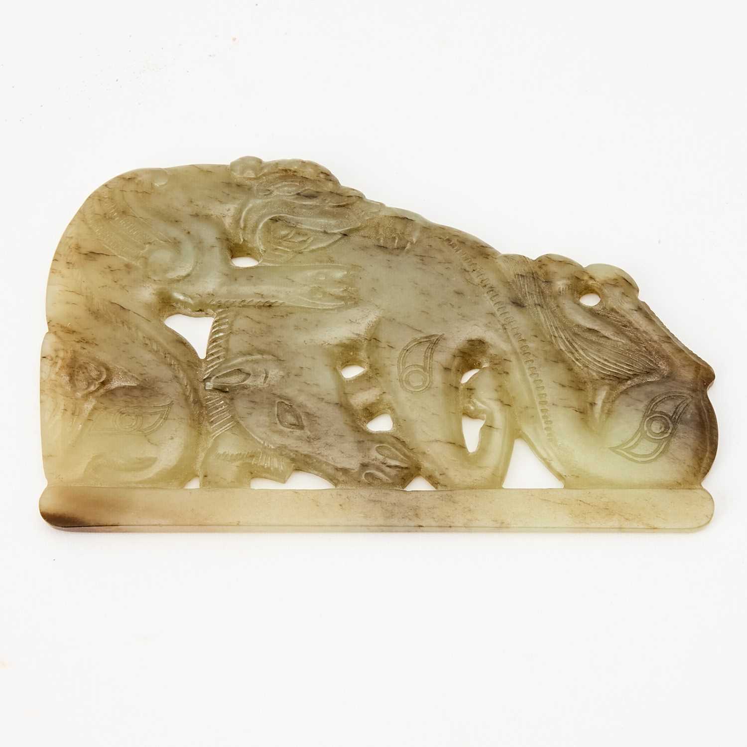 Lot 516 - A Chinese Archaistic Jade Carving