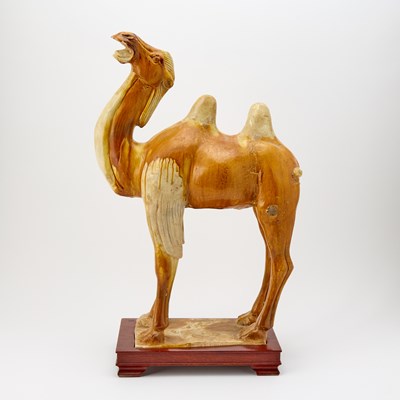 Lot 615 - A Chinese Sancai Glazed Pottery Figure of a Bactrian Camel