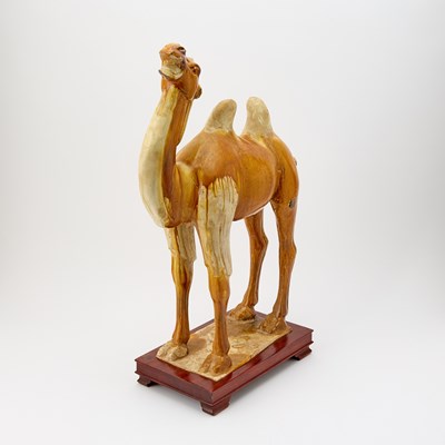 Lot 615 - A Chinese Sancai Glazed Pottery Figure of a Bactrian Camel