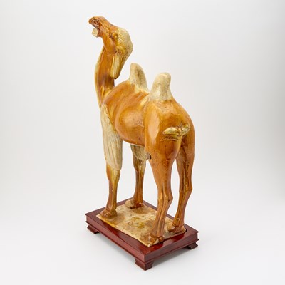 Lot 615 - A Chinese Sancai Glazed Pottery Figure of a Bactrian Camel