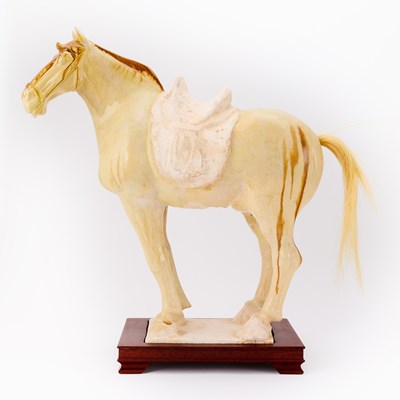 Lot 164 - A Chinese Sancai Glazed Pottery Figure of a Horse