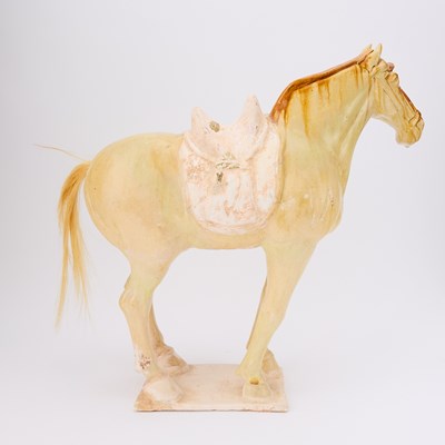 Lot 164 - A Chinese Sancai Glazed Pottery Figure of a Horse