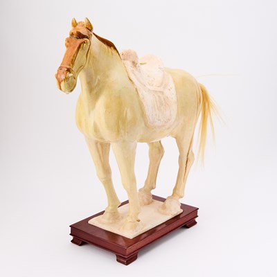 Lot 164 - A Chinese Sancai Glazed Pottery Figure of a Horse