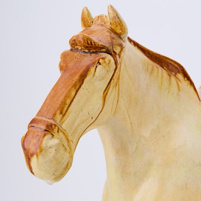 Lot 164 - A Chinese Sancai Glazed Pottery Figure of a Horse