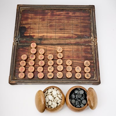Lot 107 - A Chinese Carved 'Xiangqi' Chess Set