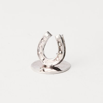 Lot 677 - Equestrian Interest: Set of Eighteen English Sterling Silver Horseshoe-Form Name Card Holders