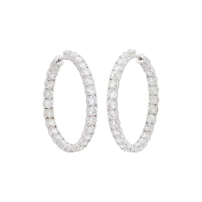 Lot 1069 - Pair of White Gold and Diamond Hoop Earrings