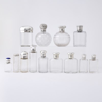 Lot 202 - Group of Sterling Silver Mounted Glass Perfume and Dresser Bottles