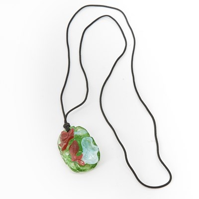 Lot 554 - A Chinese Three-Color Glass Pendant