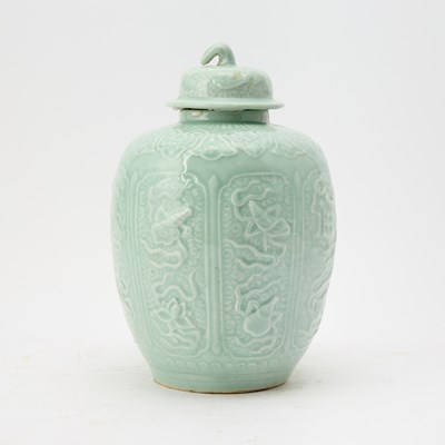 Lot 246 - A Chinese Carved Celadon Porcelain Jar and Cover