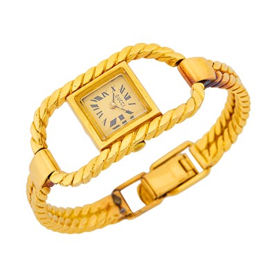 Lot 1099 - Gucci Gold Bracelet-Watch