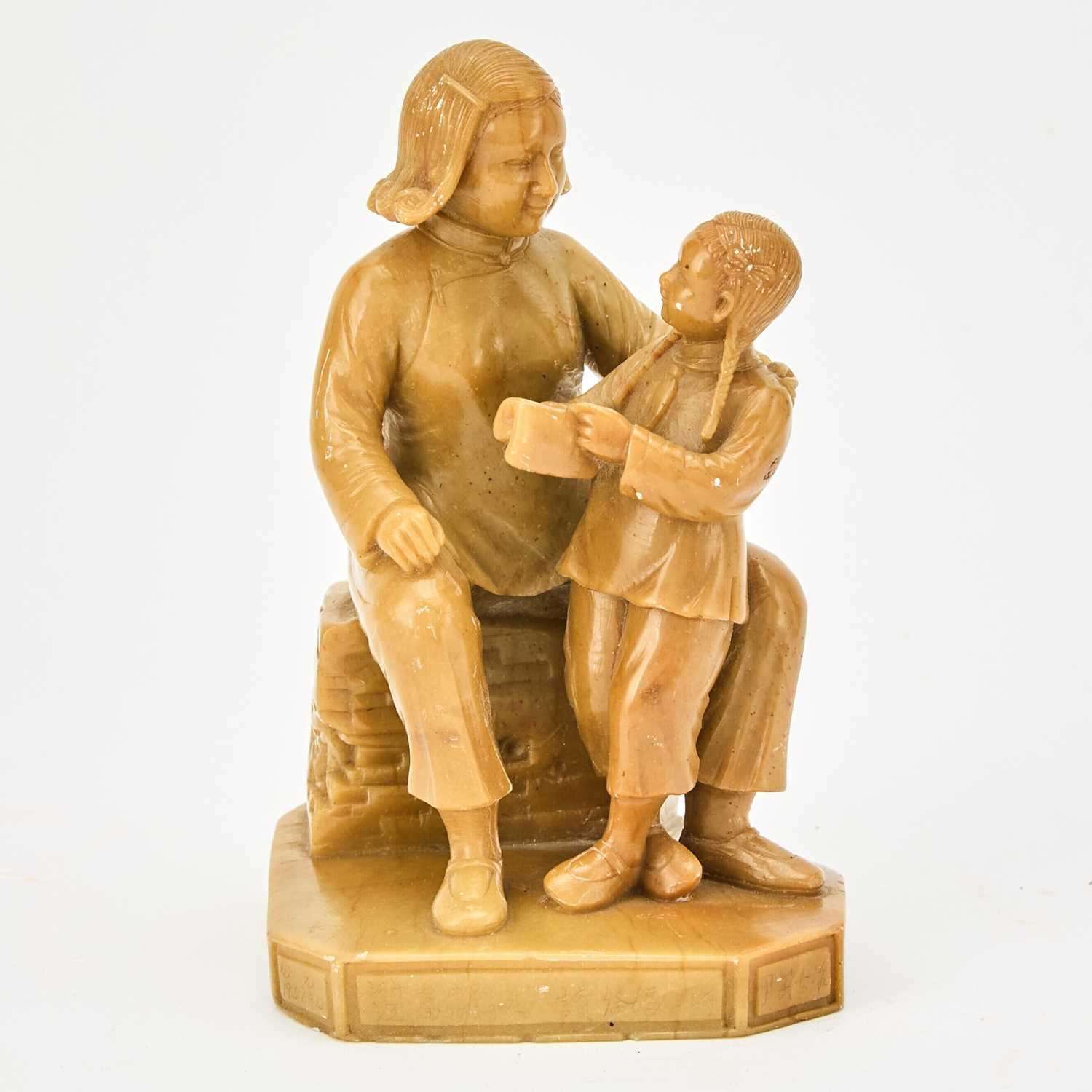 Lot 563 - A Chinese Soapstone Figural Carving